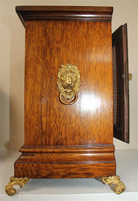 A late Victorian golden oak bracket clock, 13in.
